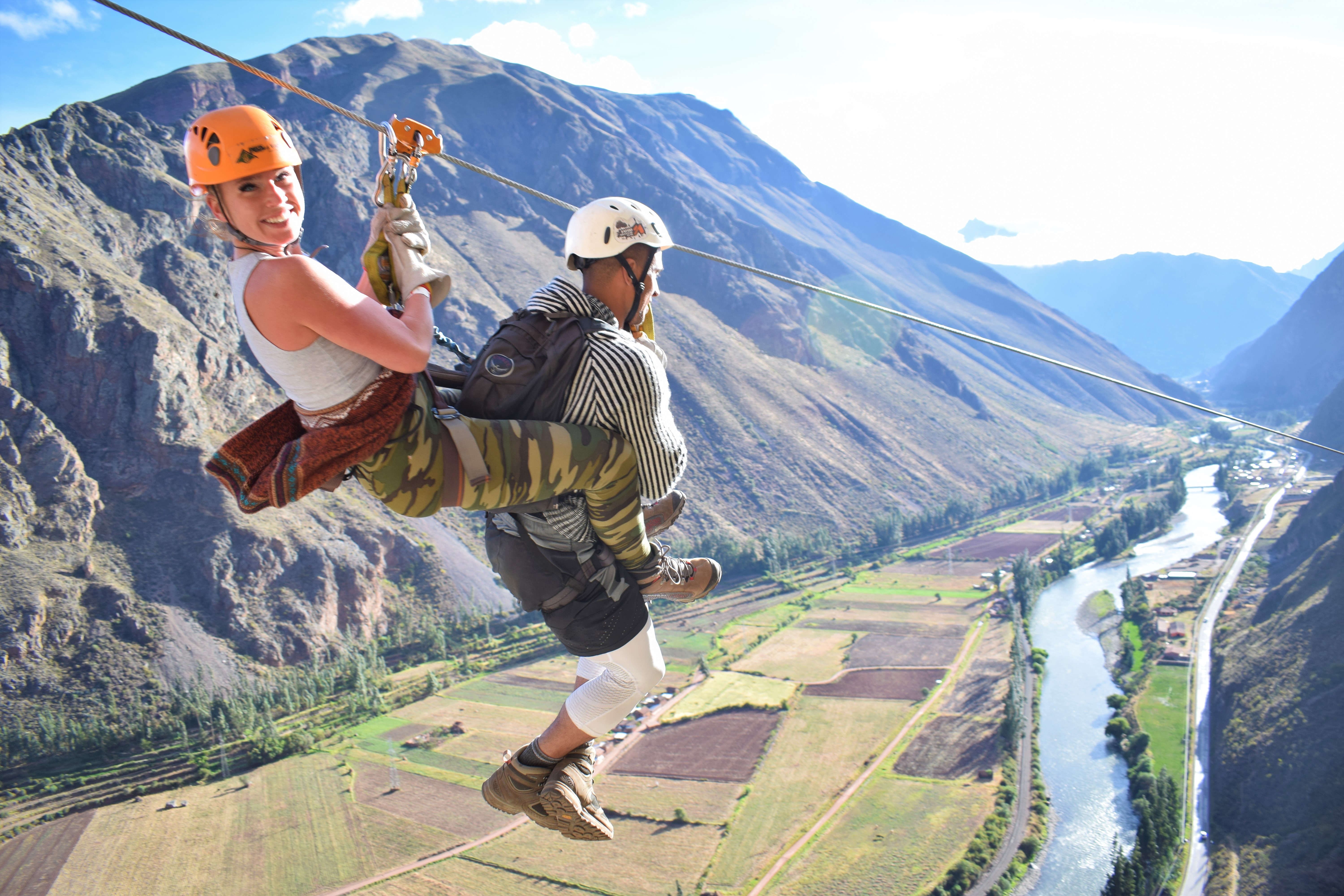 Branden Collinsworth and Markie Henderson zip line over the Sacred Valley of the Incas.