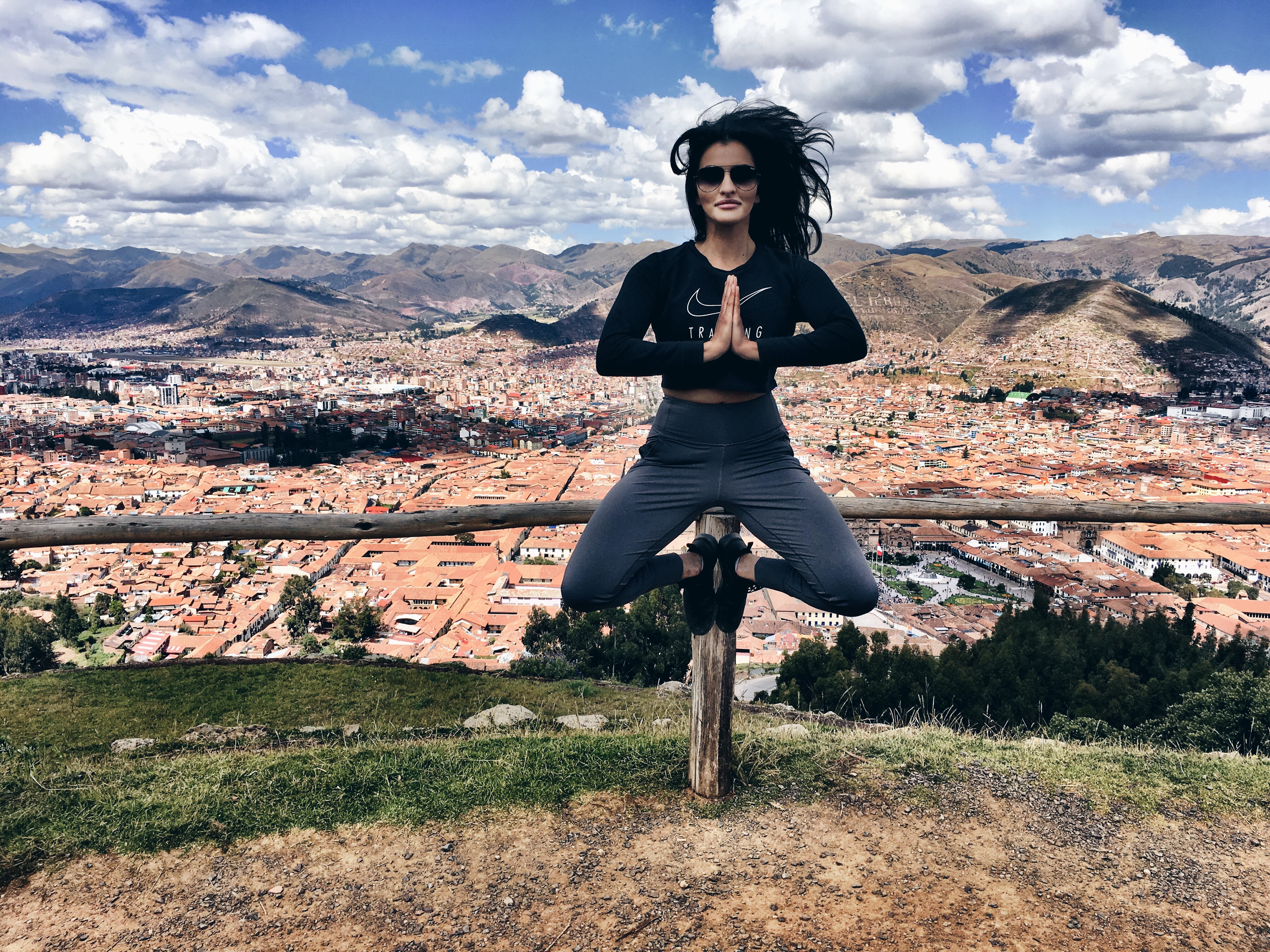 Poonam Muta levitating at the top of Cusco, Peru