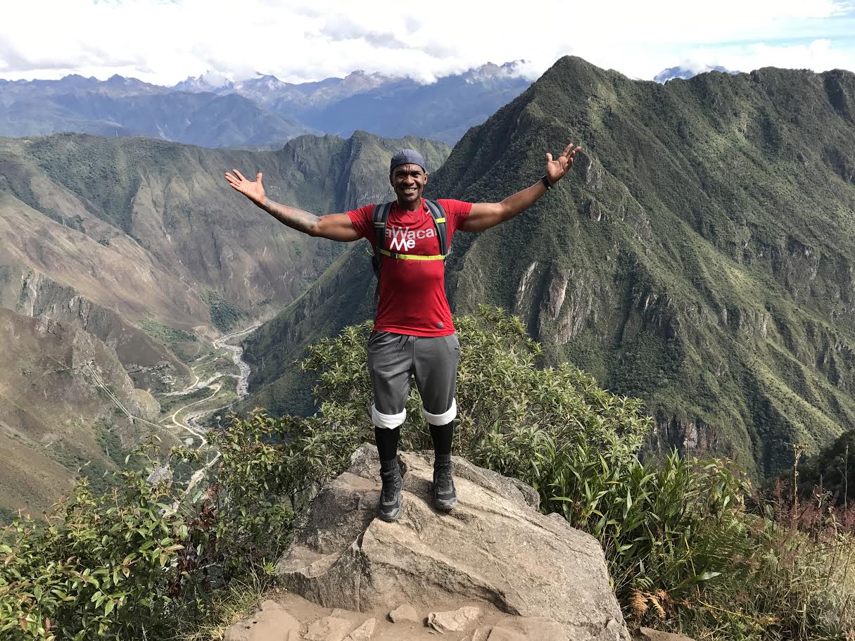Robert Chandler at the top of Machu Picchu while on Warrior Retreats